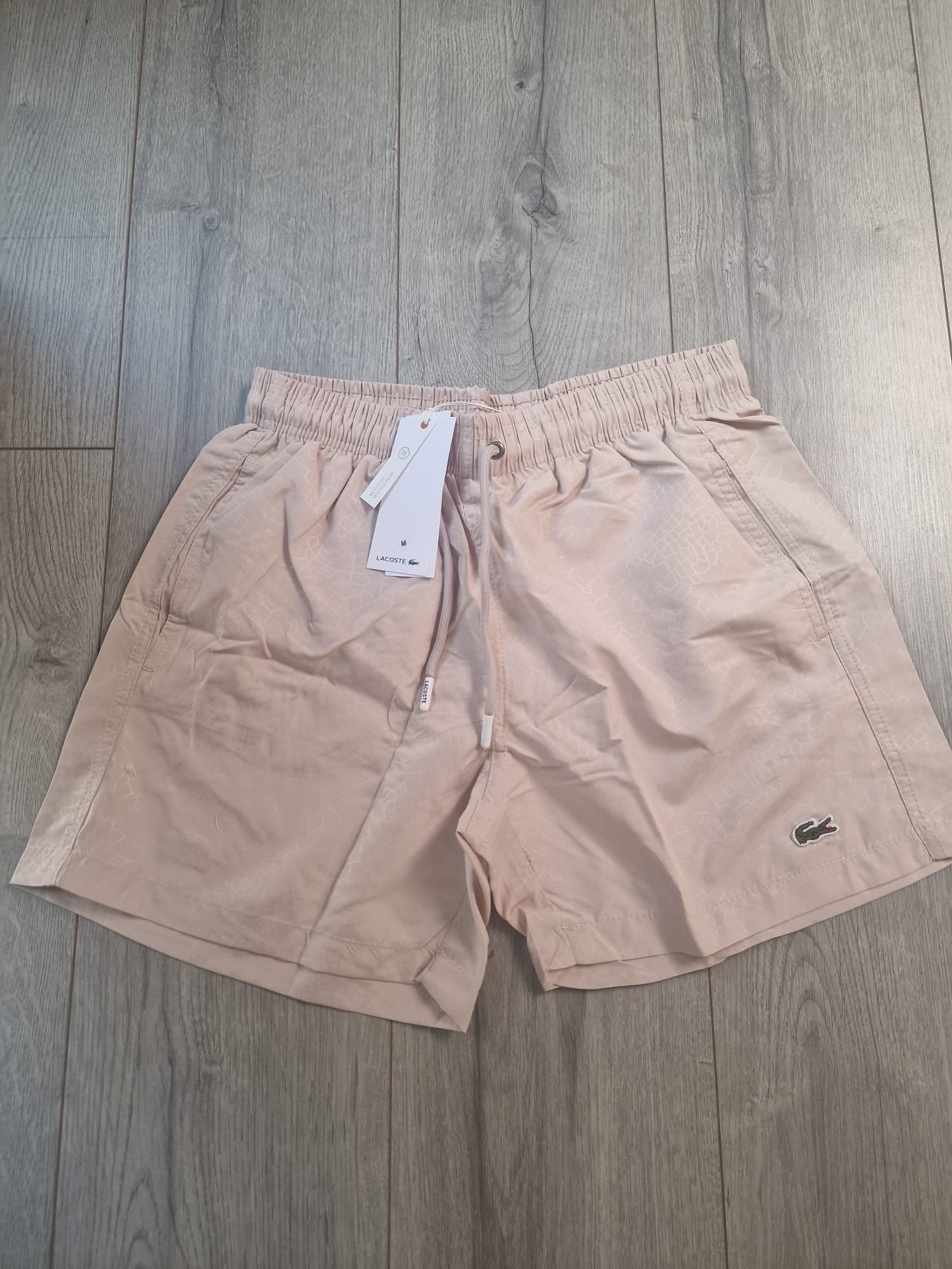 Lacoste kupaci sorc