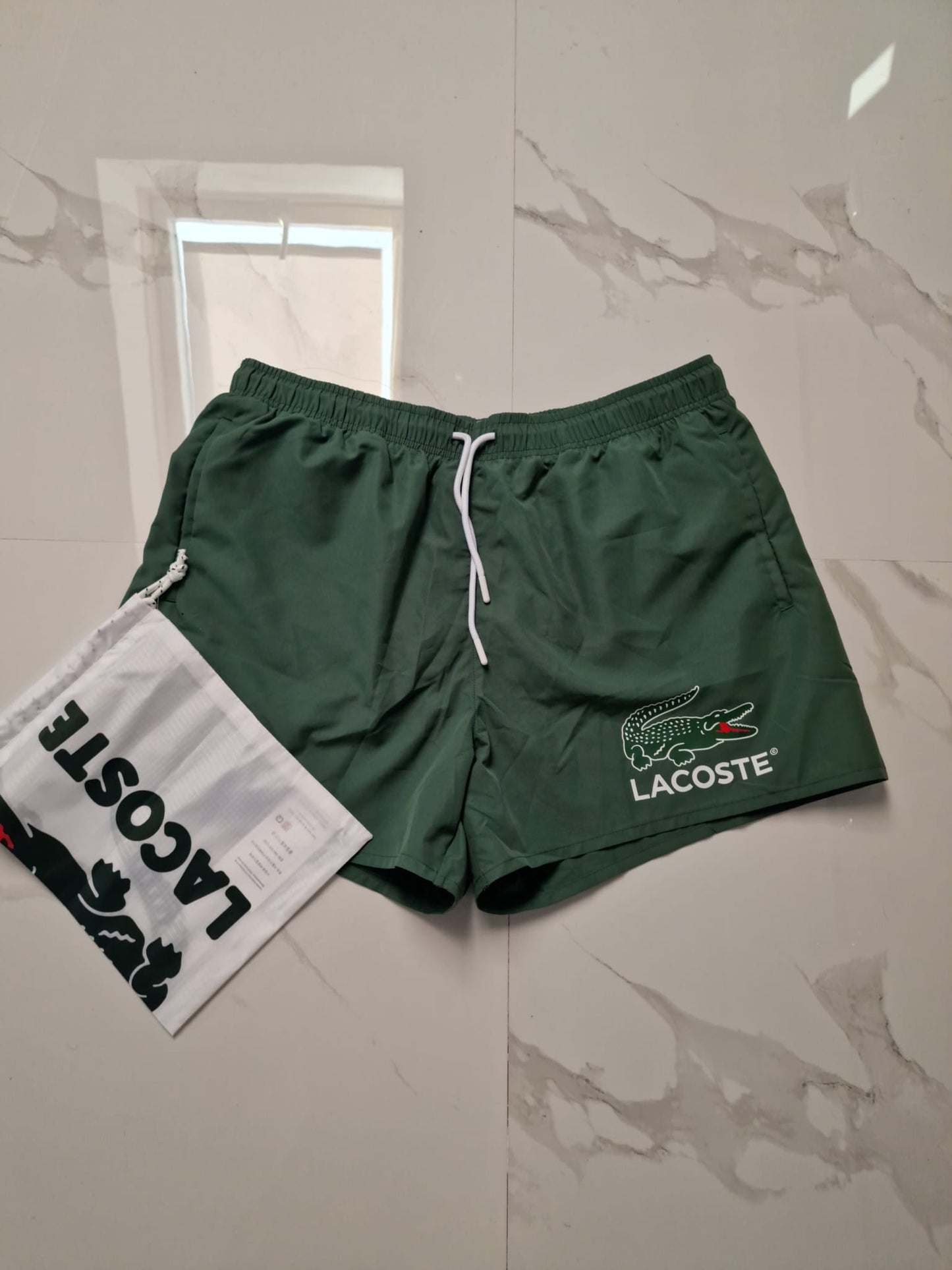 Lacoste kupaci sorc