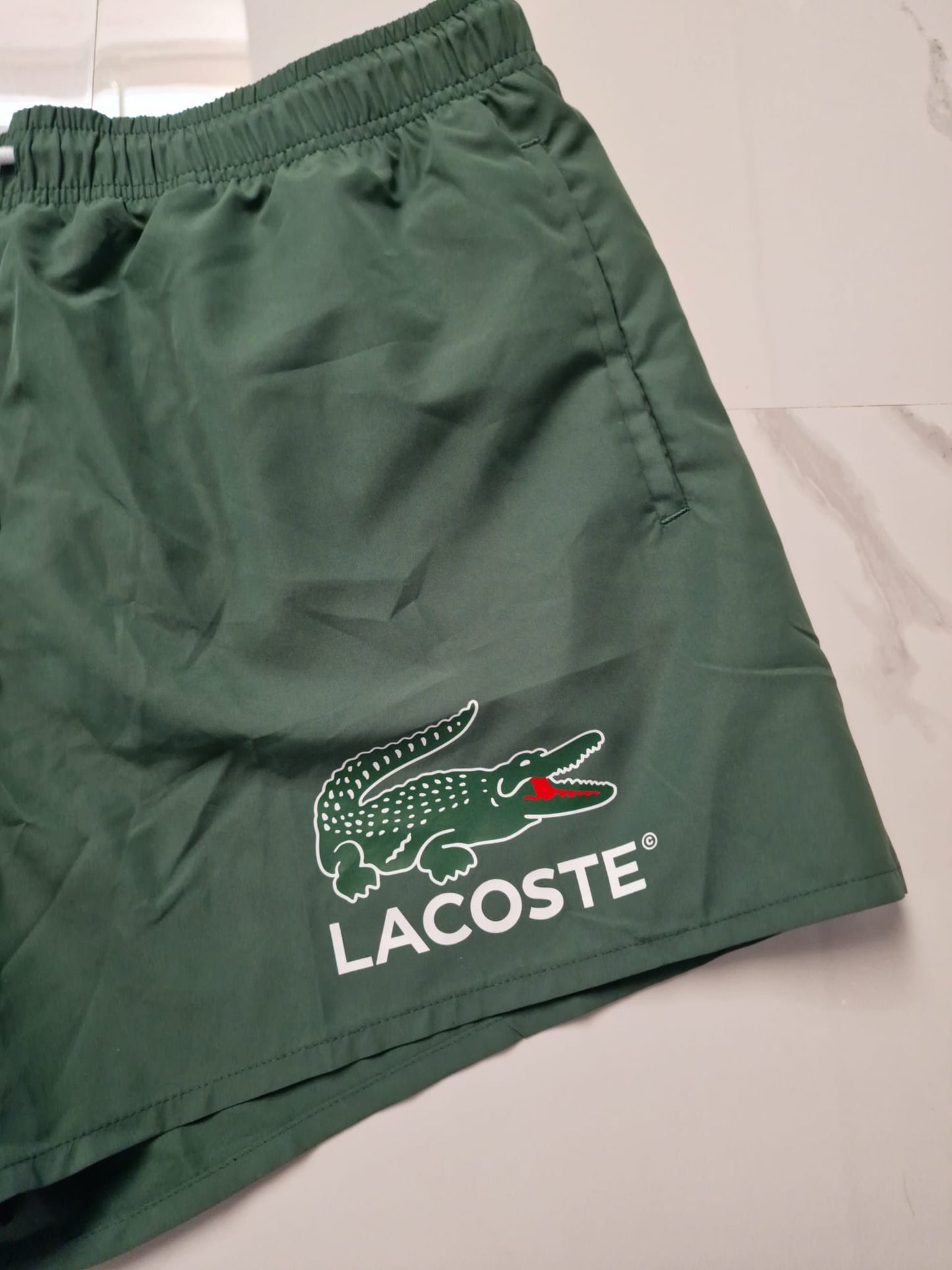 Lacoste kupaci sorc