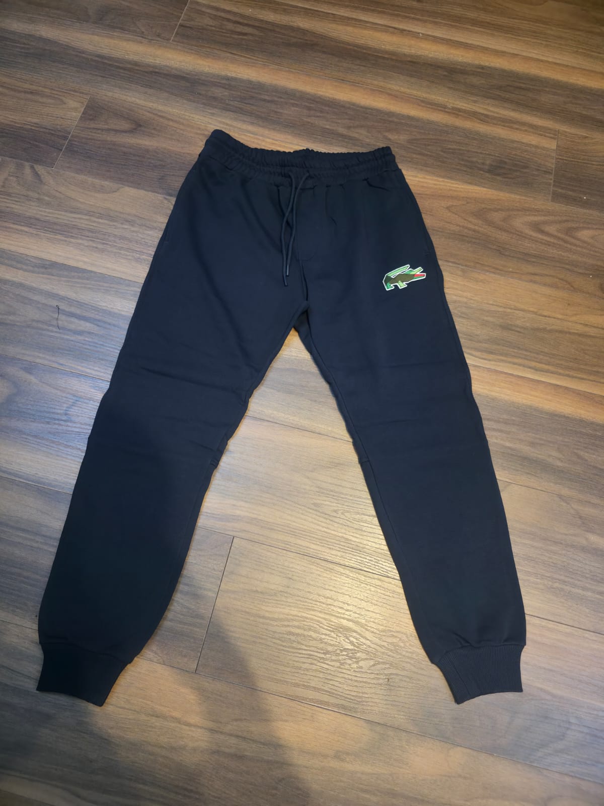 Lacoste donji deo trenerke